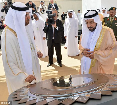 President Nahyan (right) chats with Dr Al Jaber: By concentrating heat from direct sunlight onto oil-filled pipes, Shams 1 produces steam, which drives a turbine to generate electricity.