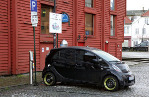 A Mitsubishi i MiEV electric car is plugged-in to a power point and charged on the streets of Stavanger, Norway. PRESS ASSOCIATION Photo. Picture date: Saturday September 29, 2012. Photo credit should read: Yui Mok/PA Wire